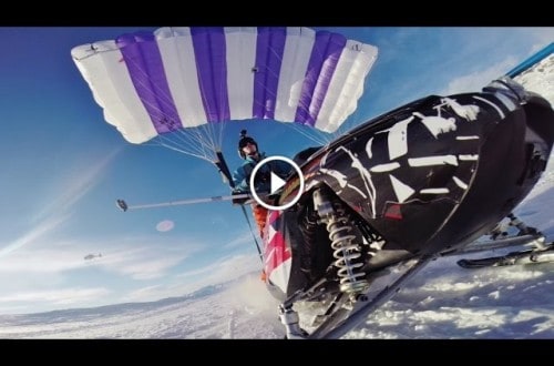 Thrill Seeker Flies His Snowmobile Off A Mountain