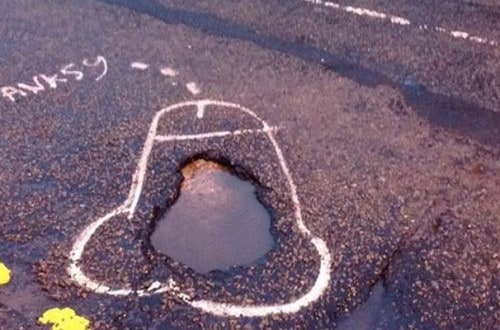 Graffiti Artist Spray Paints Penises On Potholes To Get Them Fixed