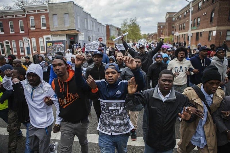 Heartwarming And Redeeming Photo From Baltimore Protests Going Viral