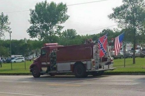 Minnesota Firefighter Under Fire For Flying Confederate Flag During A Parade