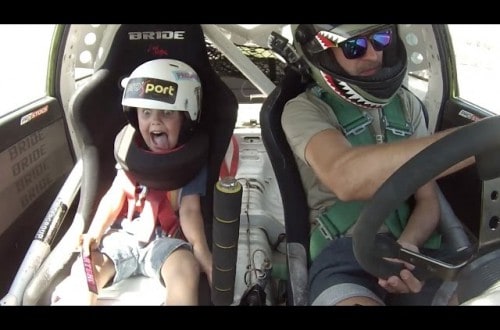 Race Car Driver Takes His Son Along For A Ride, His Reaction Is Priceless