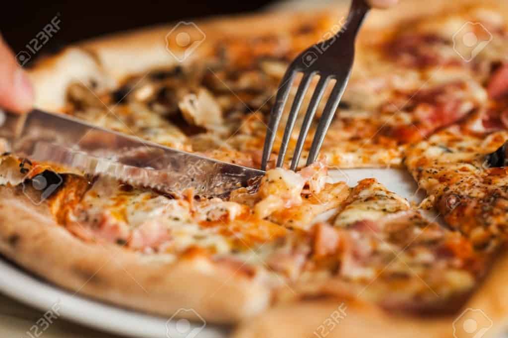 Research Reveals Personality Traits Related To Pizza Eating Habits