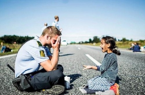 Heartwarming Image Of Danish Officer Playing Games With Syrian Child Takes The Internet By Storm