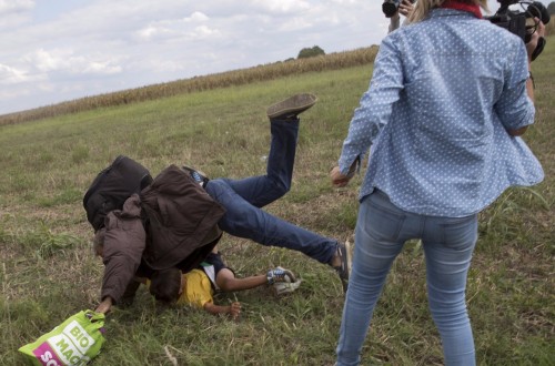 Hungarian Camerawoman Caught Kicking And Tripping Refugees