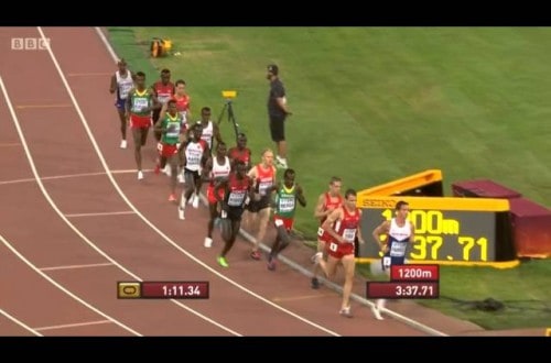 Mo Farah Stops For A Drink Before Winning 5,000 Metres