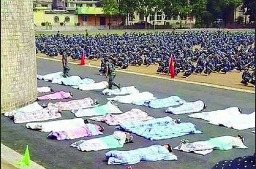 Students Forced To Lie In The Sun As Punishment For Not Keeping Room Clean