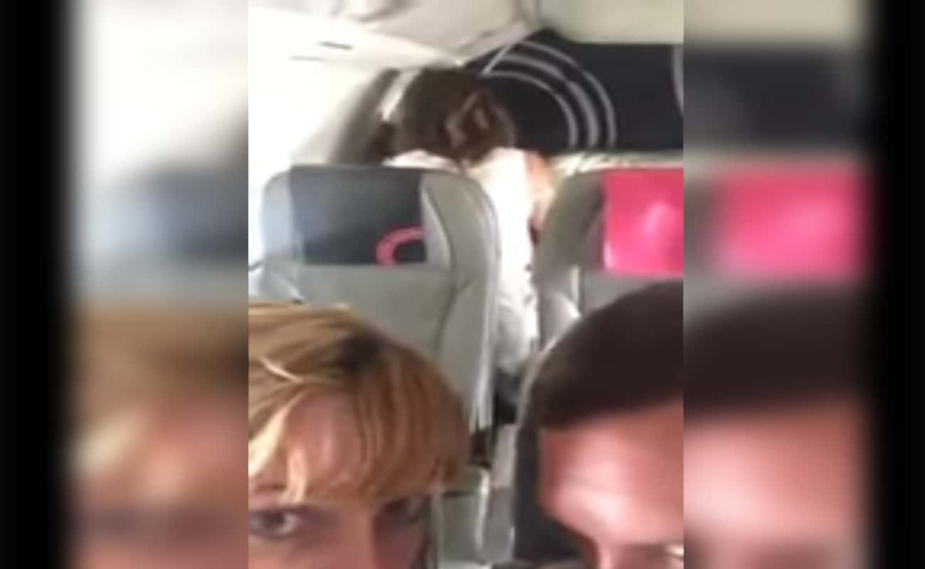 Couple Shocked As Two People Join The Mile High Club Right Behind Them